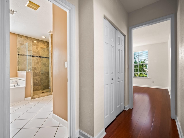 2123 Fernleigh Dr, Tallahassee, FL 32311 - corridor with wood finished floors and baseboards