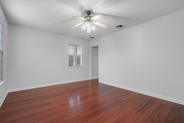 2123 Fernleigh Dr, Tallahassee, FL 32311 - empty room featuring wood finished floors, a ceiling fan, and baseboards