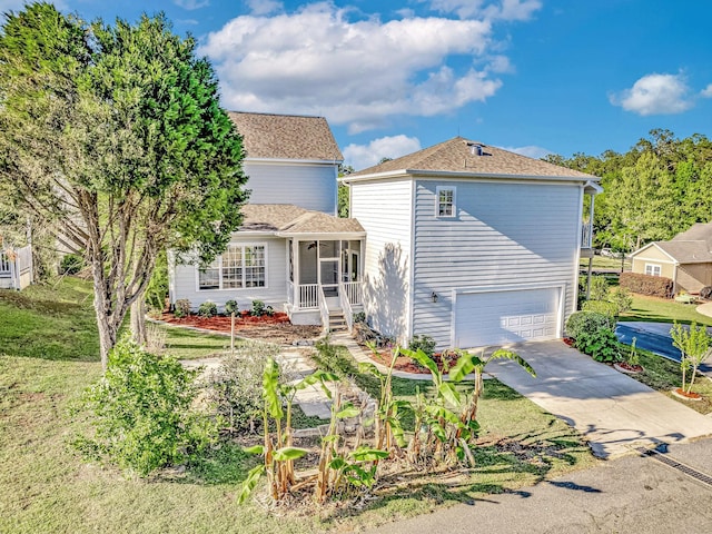 2123 Fernleigh Dr, Tallahassee, FL 32311 - view of front of house featuring an attached garage, concrete driveway, and a shingled roof