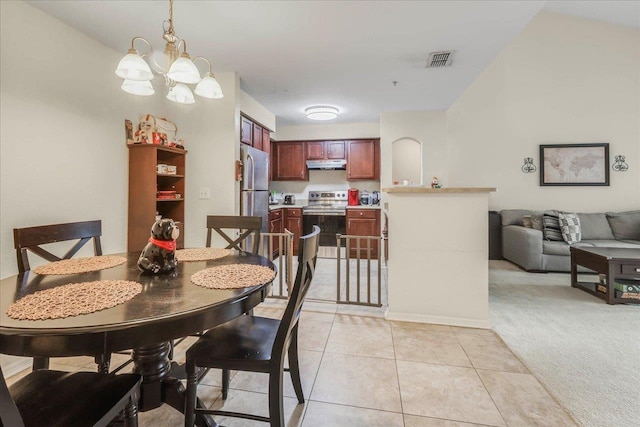 dining area featuring light tile patterned floors, visible vents, a notable chandelier, and light carpet