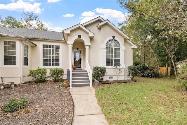 view of front of home with a front yard