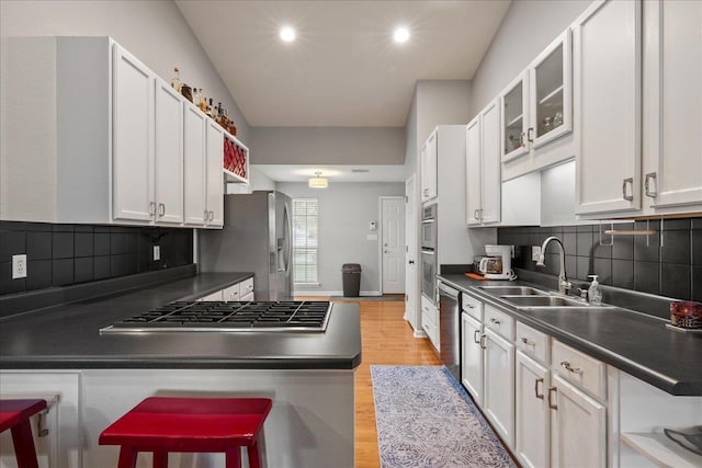 kitchen with white cabinetry and sink