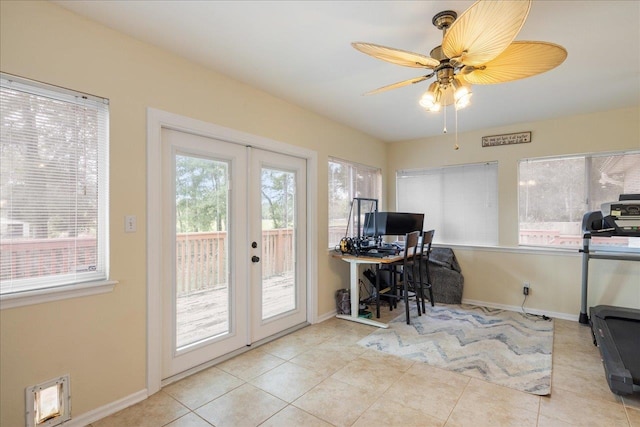 tiled office space with ceiling fan and french doors