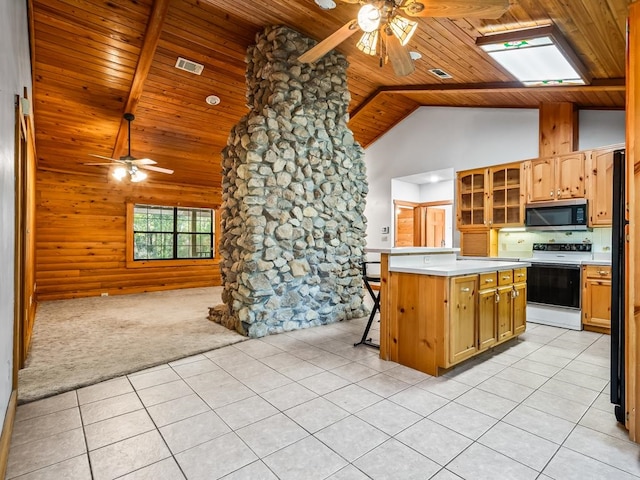 kitchen with light colored carpet, wooden ceiling, high vaulted ceiling, a skylight, and white electric range