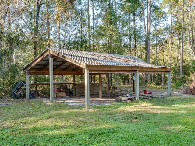 view of property's community featuring a yard and a gazebo