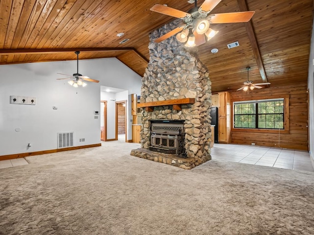 unfurnished living room featuring light tile patterned flooring, beamed ceiling, wood ceiling, and high vaulted ceiling