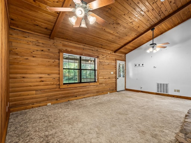 empty room featuring wood ceiling, carpet flooring, and vaulted ceiling with beams