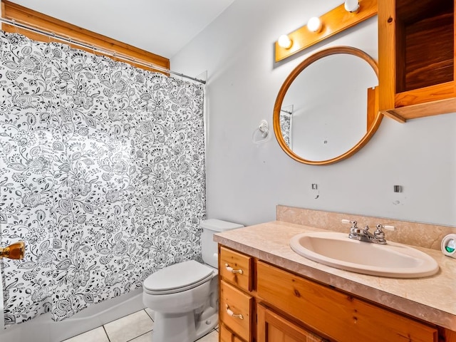 bathroom featuring vanity, tile patterned floors, toilet, and a shower with curtain