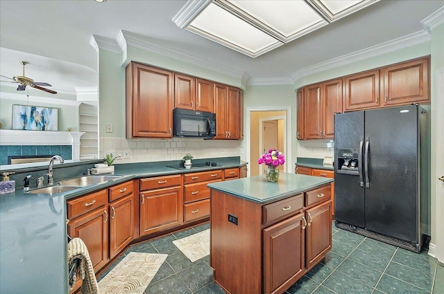kitchen featuring brown cabinets, a sink, a ceiling fan, backsplash, and black appliances