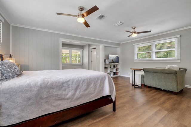1818 Homewood Rd, Tallahassee, FL 32303 - bedroom featuring crown molding, wood finished floors, baseboards, and a ceiling fan
