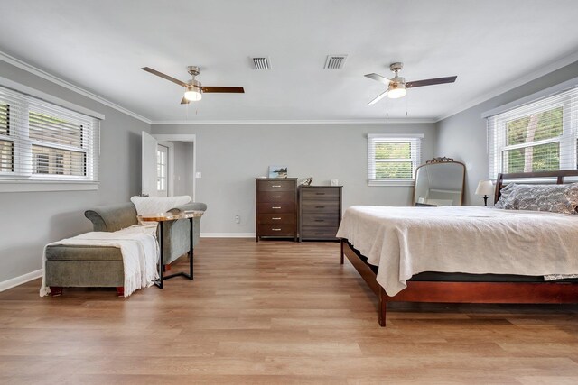1818 Homewood Rd, Tallahassee, FL 32303 - bedroom with ornamental molding, light wood finished floors, baseboards, and a ceiling fan