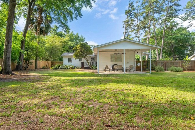 1818 Homewood Rd, Tallahassee, FL 32303 - rear view of property with ceiling fan and a patio area