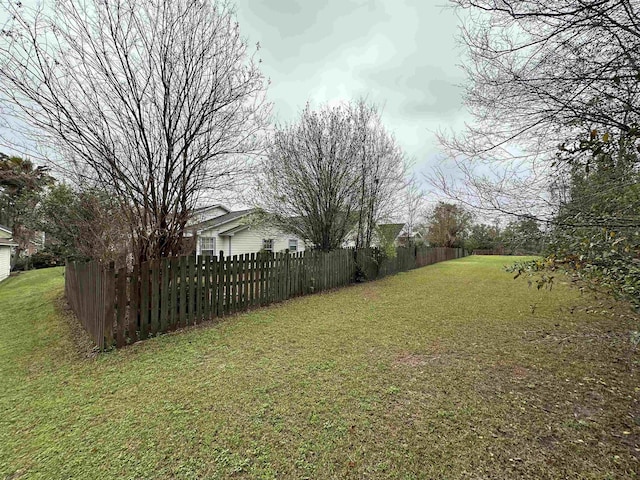 view of yard featuring fence