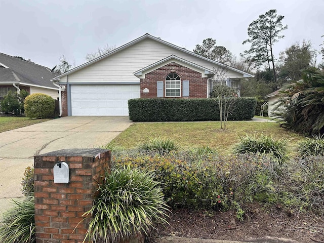 view of front of home featuring a garage, brick siding, concrete driveway, and a front yard