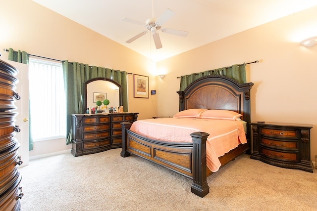 bedroom with ceiling fan and carpet floors