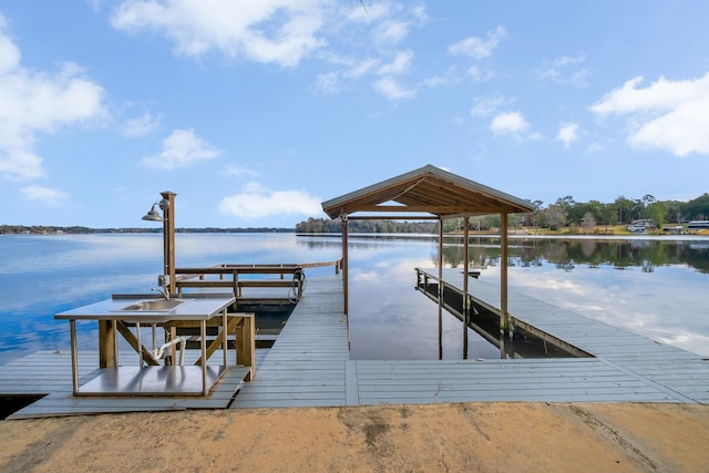 view of dock with a water view