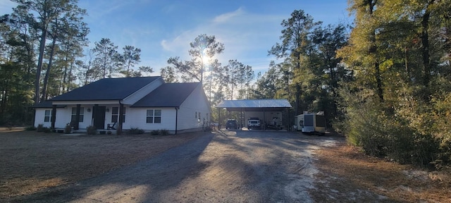 view of front facade with a carport