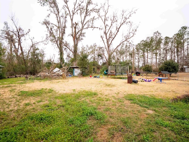 view of yard featuring a trampoline