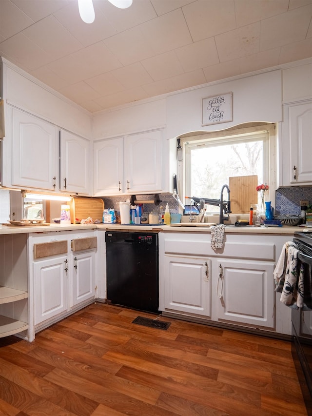 kitchen featuring sink, dishwasher, tasteful backsplash, white cabinets, and dark hardwood / wood-style flooring