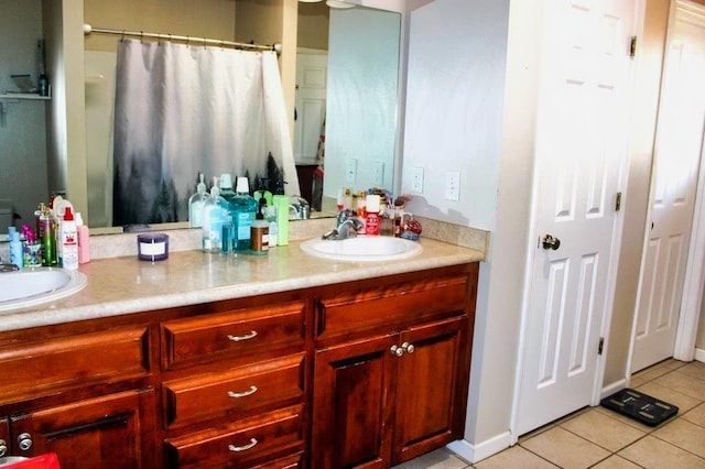 bathroom featuring vanity and tile patterned floors