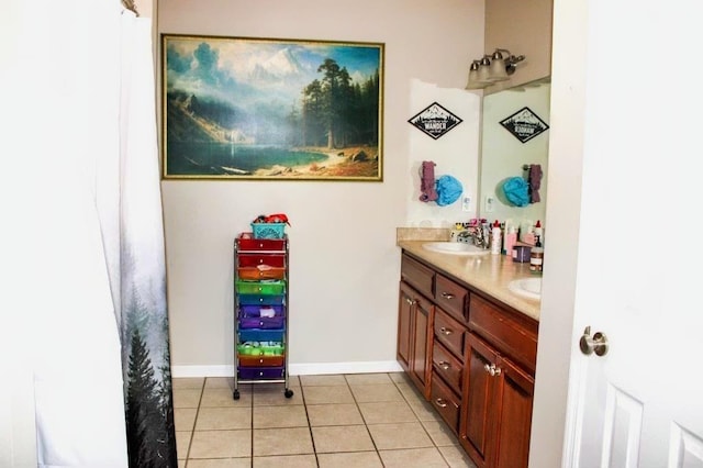 bathroom featuring vanity and tile patterned flooring