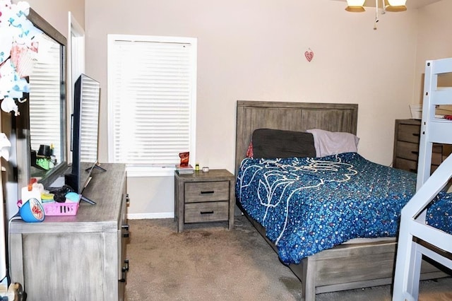 bedroom featuring carpet