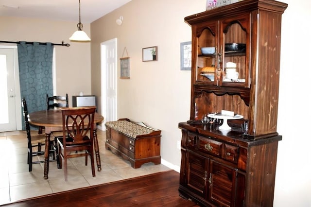 dining space featuring light wood-type flooring