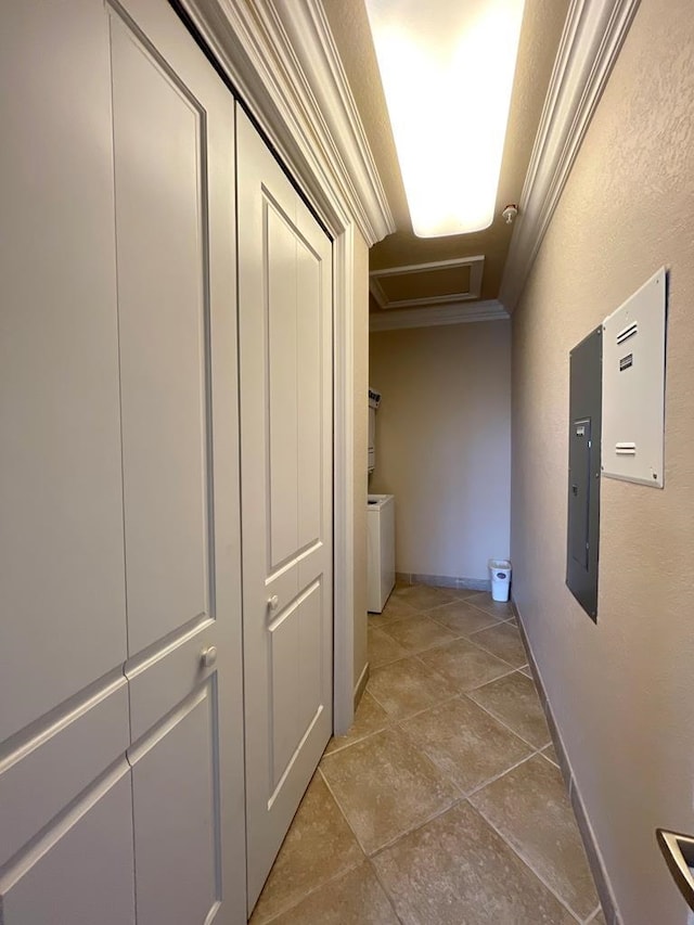 hallway featuring electric panel, tile patterned floors, and crown molding