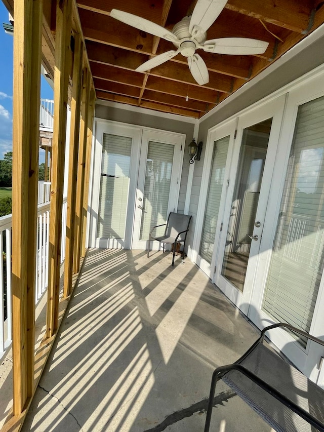 exterior space with french doors and ceiling fan