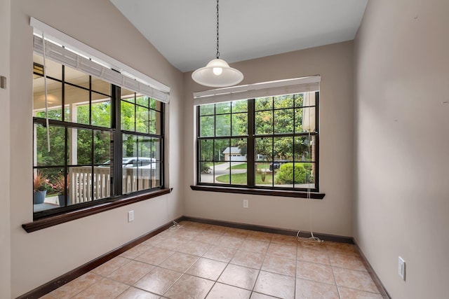 2825 Ohara Dr, Tallahassee, FL 32309 - unfurnished room with baseboards, light tile patterned flooring, and vaulted ceiling