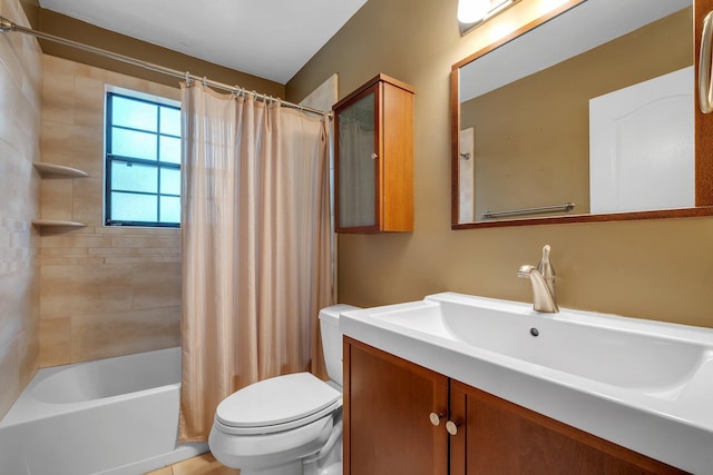 2825 Ohara Dr, Tallahassee, FL 32309 - full bathroom featuring vanity, toilet, and shower / bath combo with shower curtain