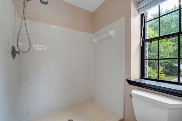2825 Ohara Dr, Tallahassee, FL 32309 - bathroom with tiled shower and toilet
