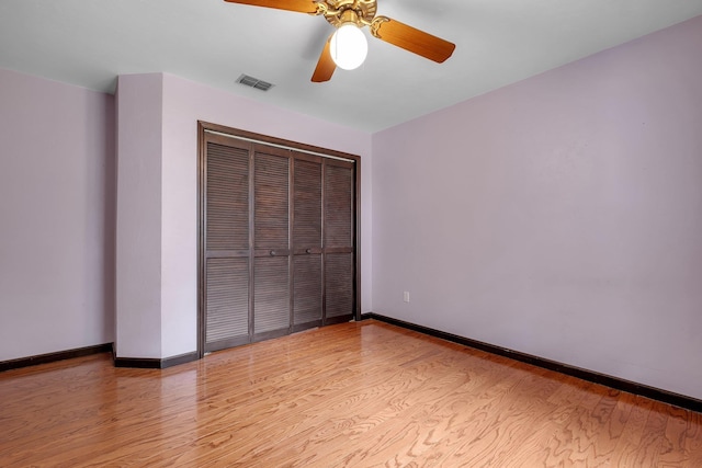 2825 Ohara Dr, Tallahassee, FL 32309 - unfurnished bedroom with light wood-style floors, a closet, baseboards, and a ceiling fan
