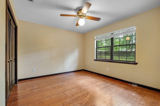 2825 Ohara Dr, Tallahassee, FL 32309 - empty room with wood finished floors, baseboards, and a ceiling fan