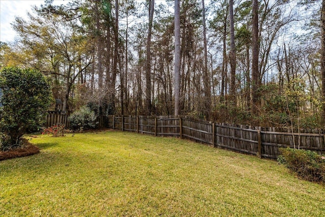 view of yard featuring a fenced backyard