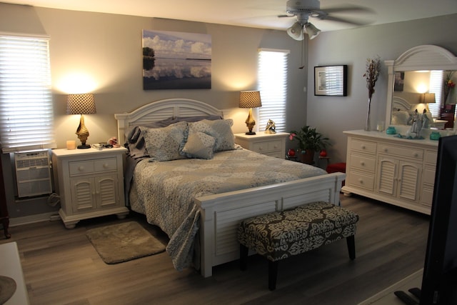 bedroom featuring ceiling fan and dark hardwood / wood-style flooring