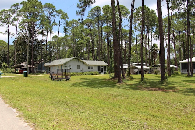 view of yard featuring a deck