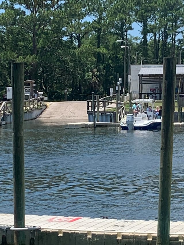 view of dock with a water view