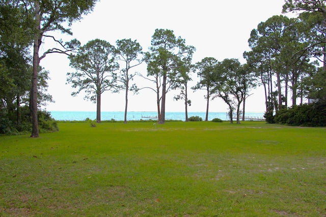 exterior space with a water view