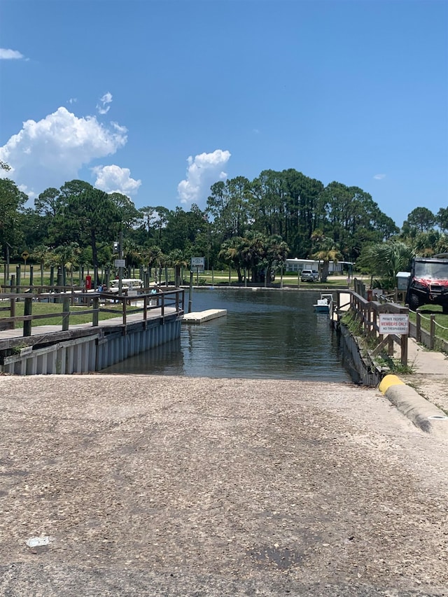 view of dock with a water view