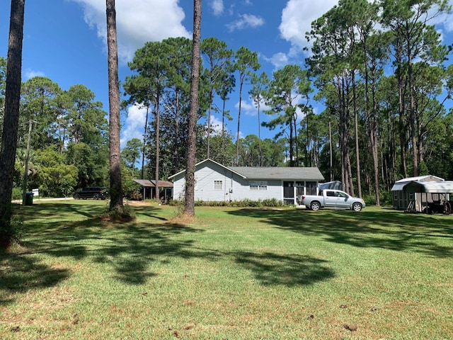 view of front of house with a front lawn