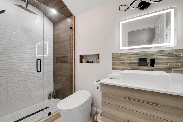 bathroom with vanity, an enclosed shower, decorative backsplash, and toilet