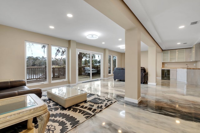 living room with sink and wine cooler