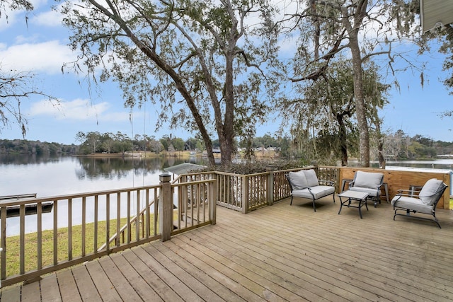 wooden terrace with a water view