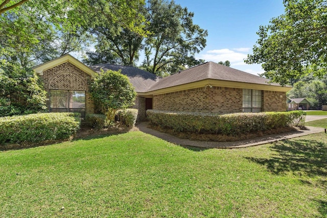 4601 Killimore Ln, Tallahassee, FL 32309 - view of front facade featuring brick siding and a front yard