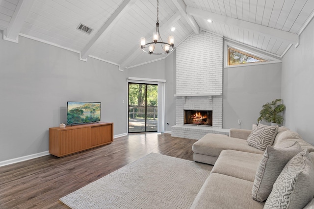 4601 Killimore Ln, Tallahassee, FL 32309 - living room with a chandelier, high vaulted ceiling, a fireplace, wood finished floors, and baseboards