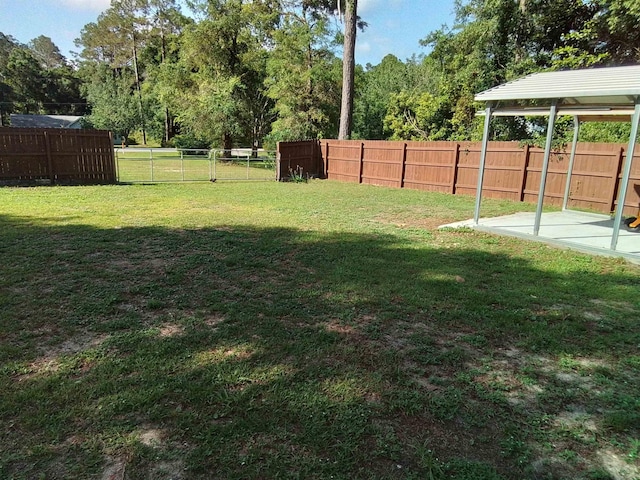 88 Wildwood Dr, Crawfordville, FL 32327 - fenced backyard featuring a patio