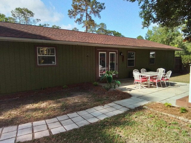 88 Wildwood Dr, Crawfordville, FL 32327 - back of property featuring a patio and roof with shingles