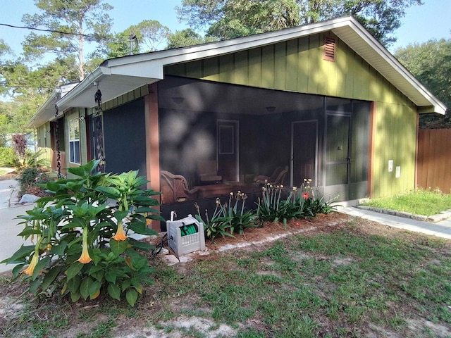88 Wildwood Dr, Crawfordville, FL 32327 - view of property exterior with a sunroom