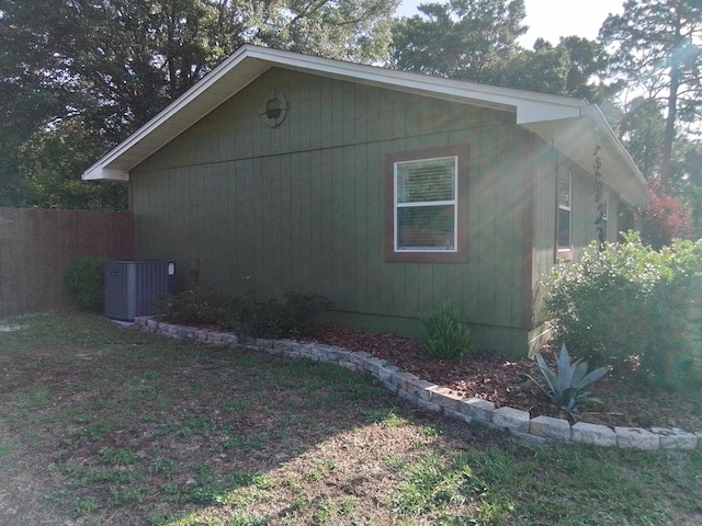 88 Wildwood Dr, Crawfordville, FL 32327 - view of side of home with a central air condition unit
